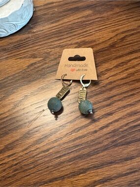 Gold and green dangly earrings